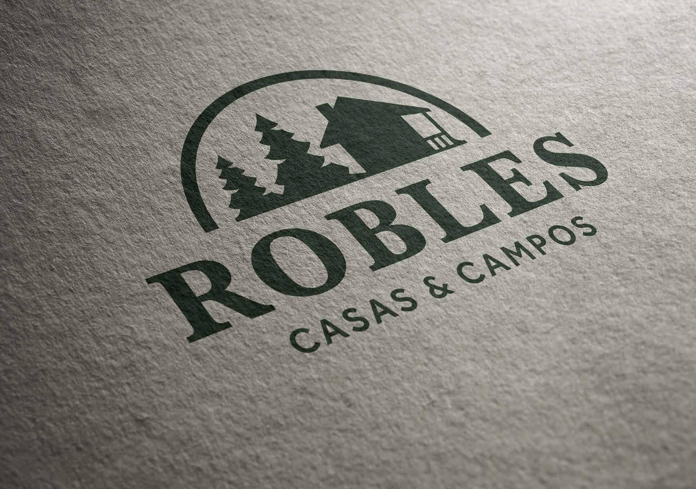 Rebranding-Robles-Aplicación-Isolotipo sobre papel rústico